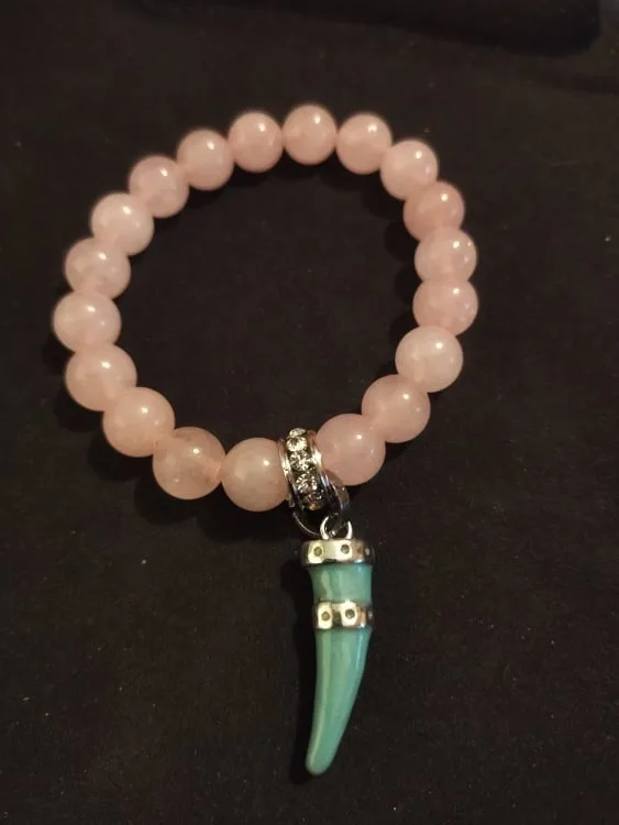 Quarzo rosa con corno